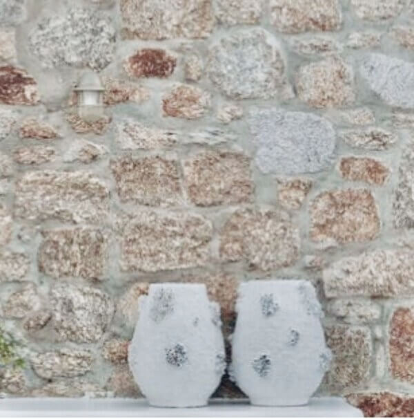 Handmade white ceramic pots with corals