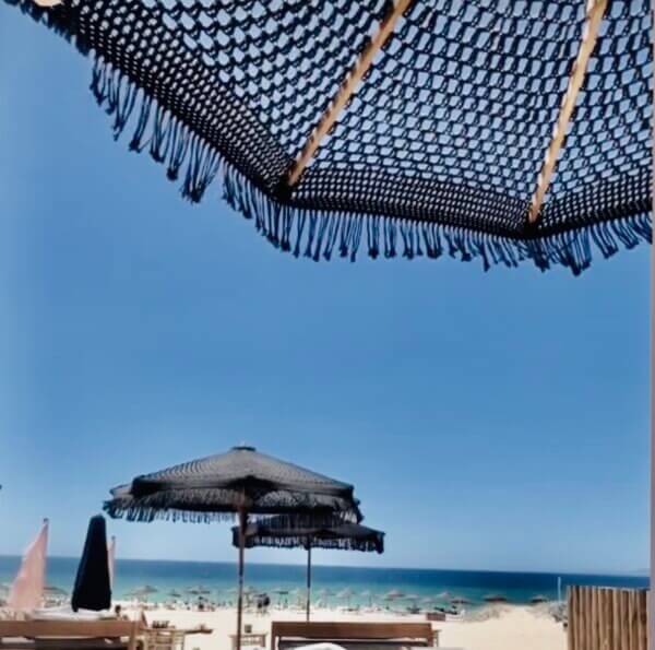 Handmade Greek UV black rope umbrellas with fringes